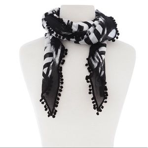 Henri Bendel ikat triangular scarf with poms